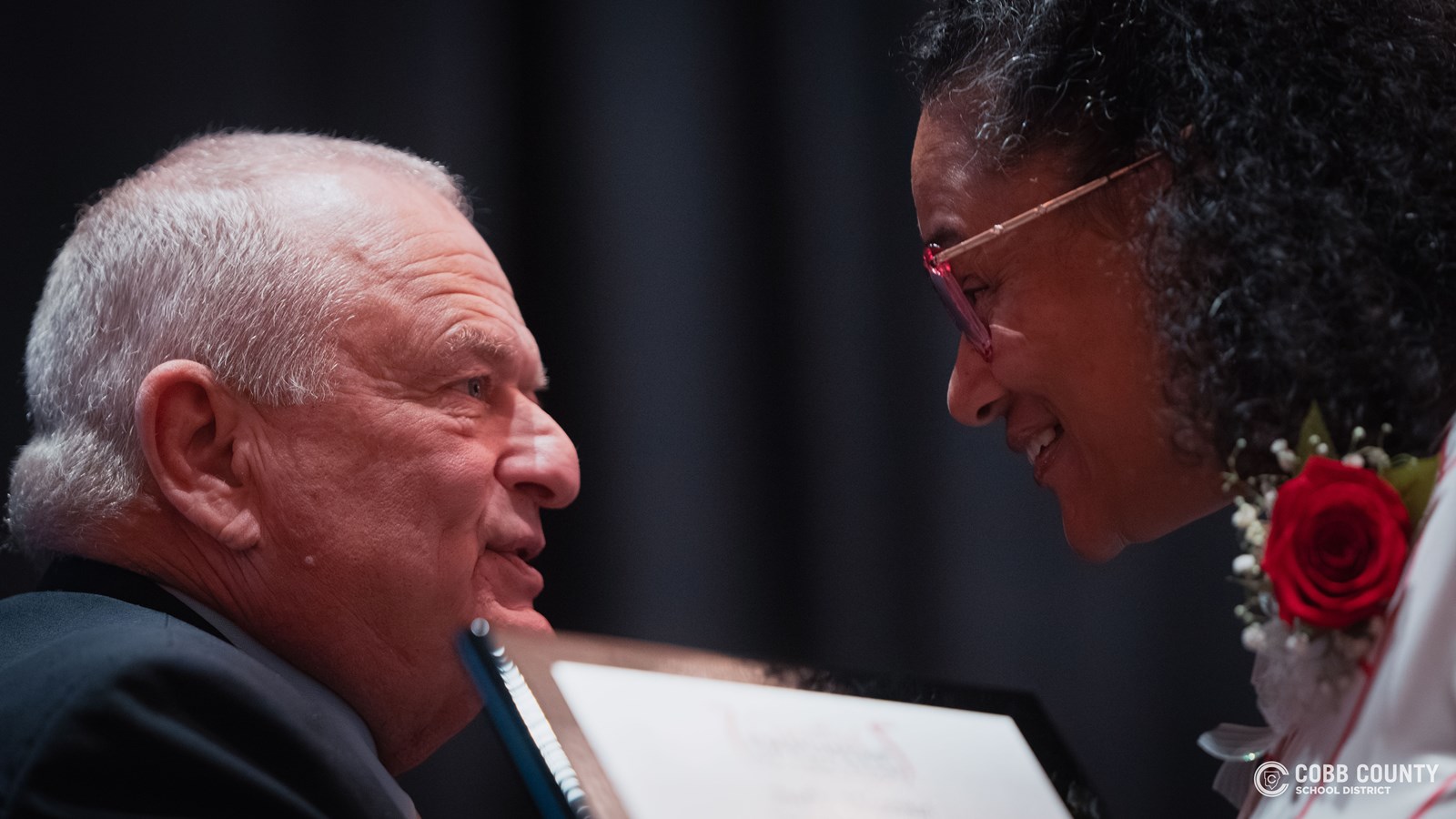 Board Member congratulating nominee 