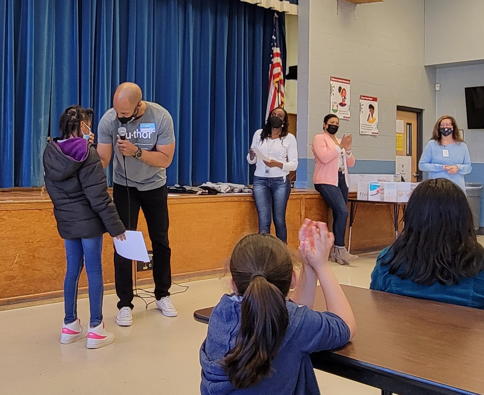 student receiving certificate