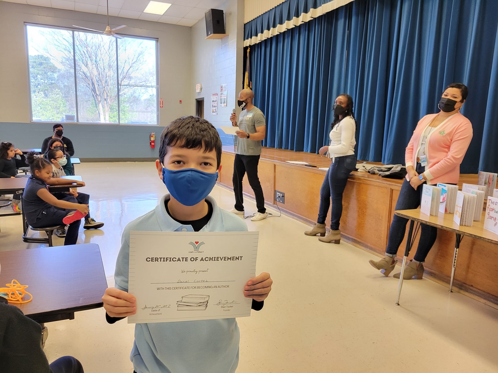 student with certificate