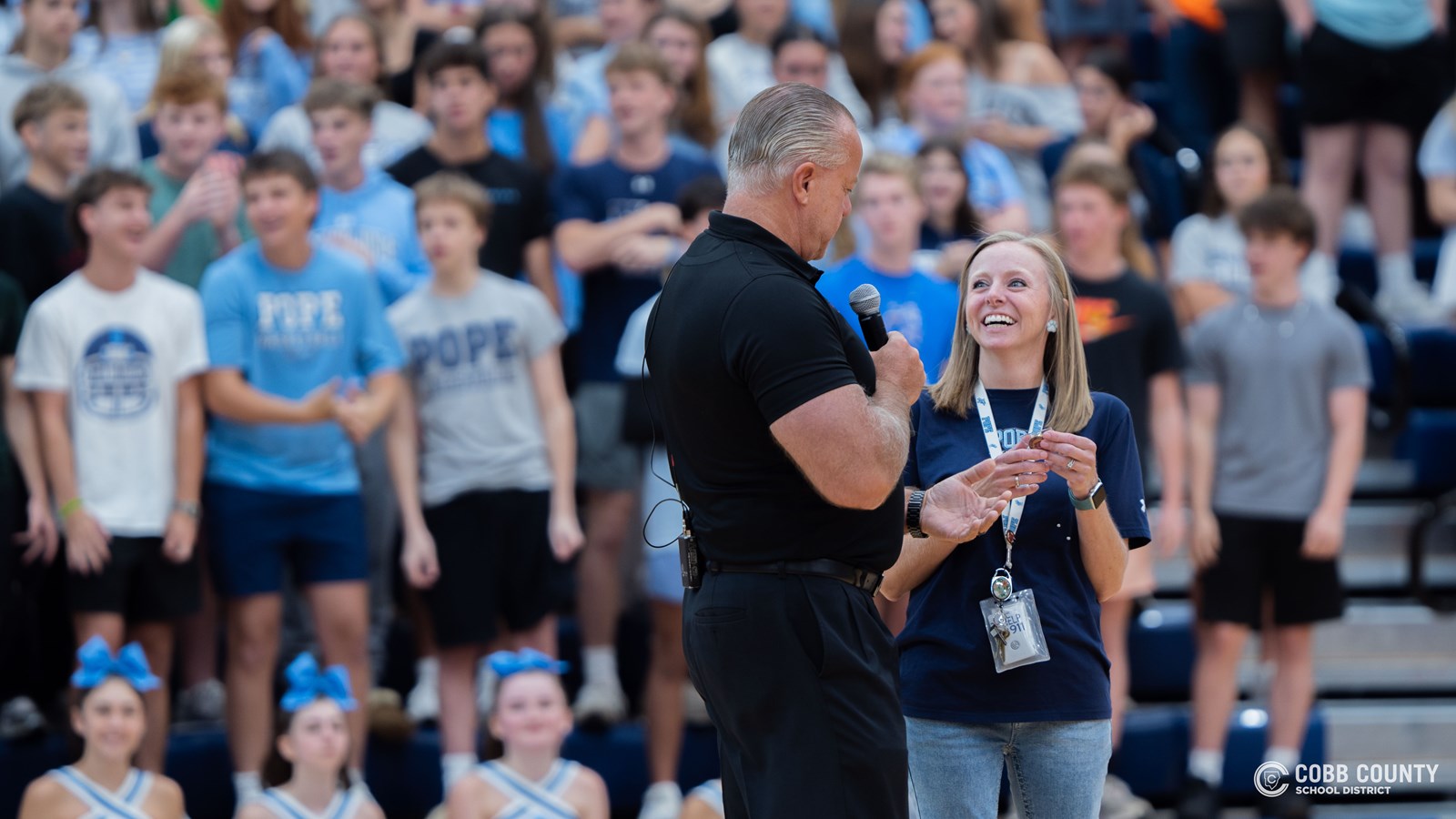 Superintendent Chris Ragsdale congratulates Ms. Dillard on being named Cobb County School District Teacher of the Year.