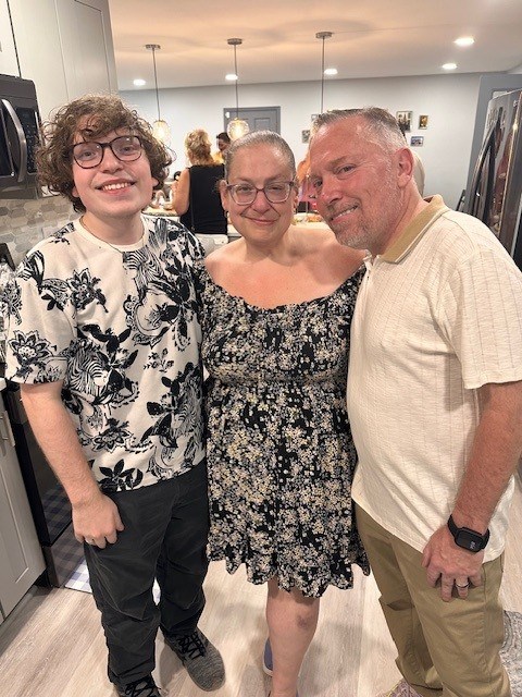 Mike Cappucci with wife and son