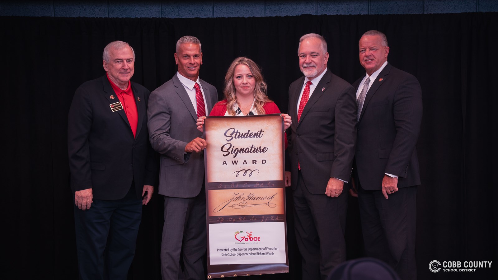 GADOE and Superintendent Richard Woods awards Pickett's Mill Elementary School the John Hancock Award.