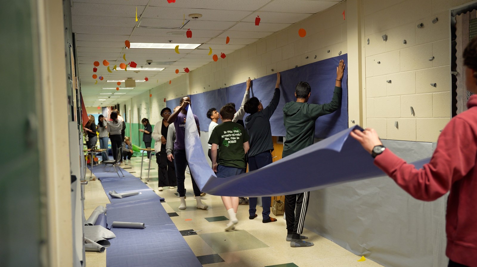 Kennesaw Mountain student volunteers prep the school for the annual Dance of the Year hosted for students with special needs from across Cobb County.