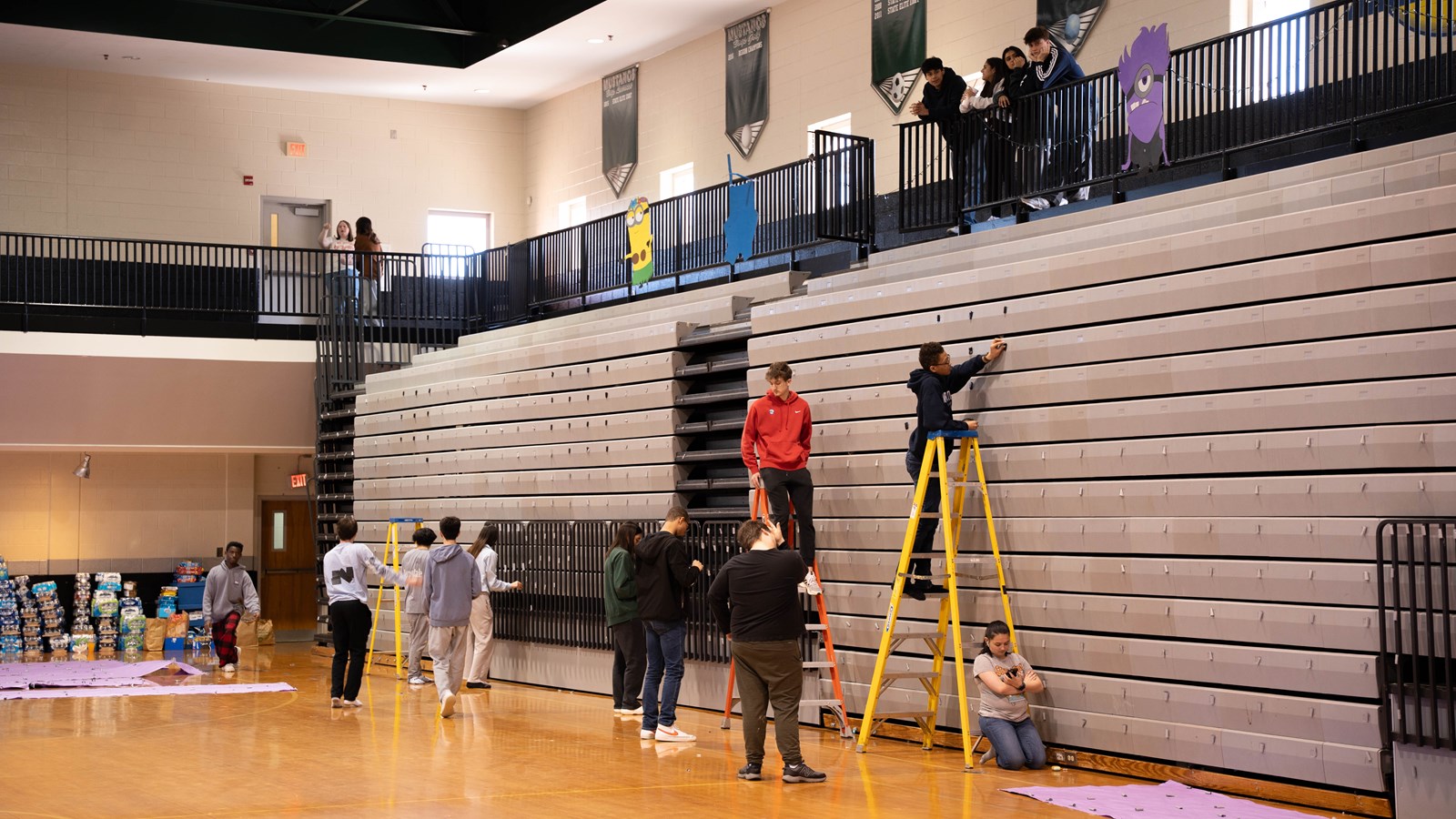 Kennesaw Mountain student volunteers prep the school for the annual Dance of the Year hosted for students with special needs from across Cobb County.