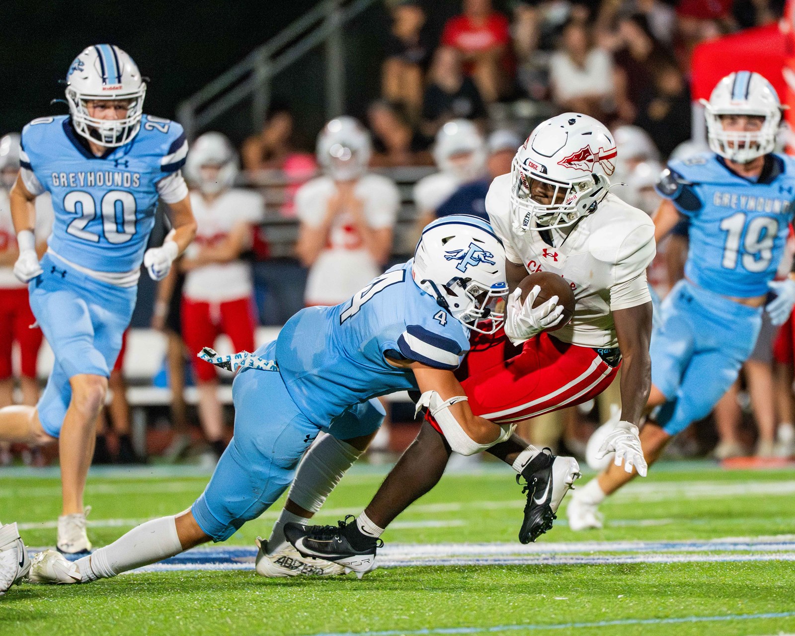 Greyhounds showing grit and determination in their matchup with Cherokee. Action photos provided courtesy of Mark He