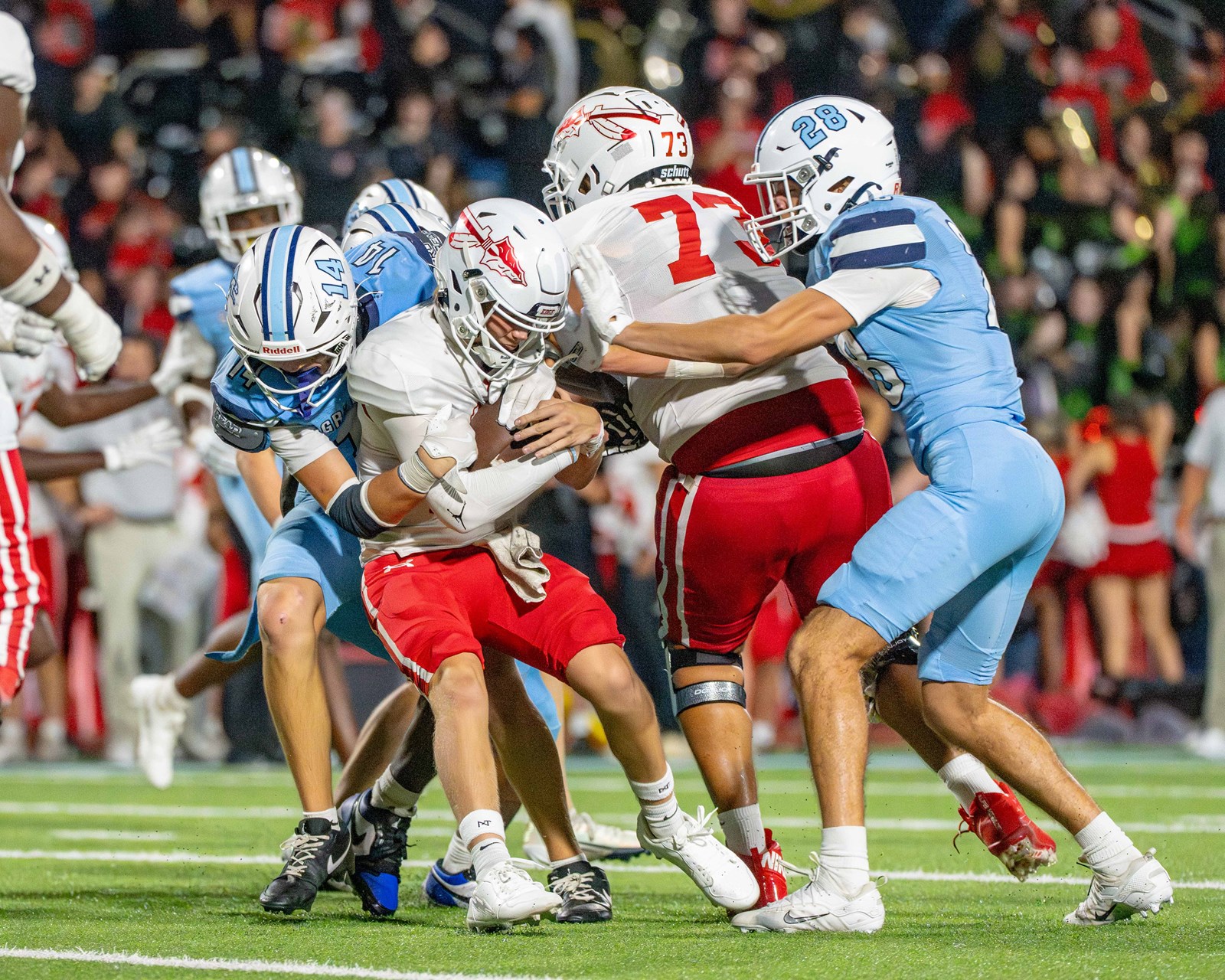 Friday Night Lights: The Pope Greyhounds battle it out against Cherokee under the lights. Action photos provided to Cobb Schools courtesy of Mark He.