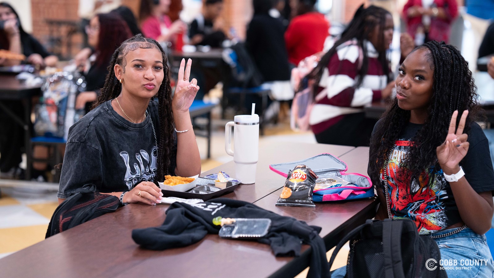 McEachern High School students enjoy catching up with friends and fueling up for a successful school year during their first lunch of the year.