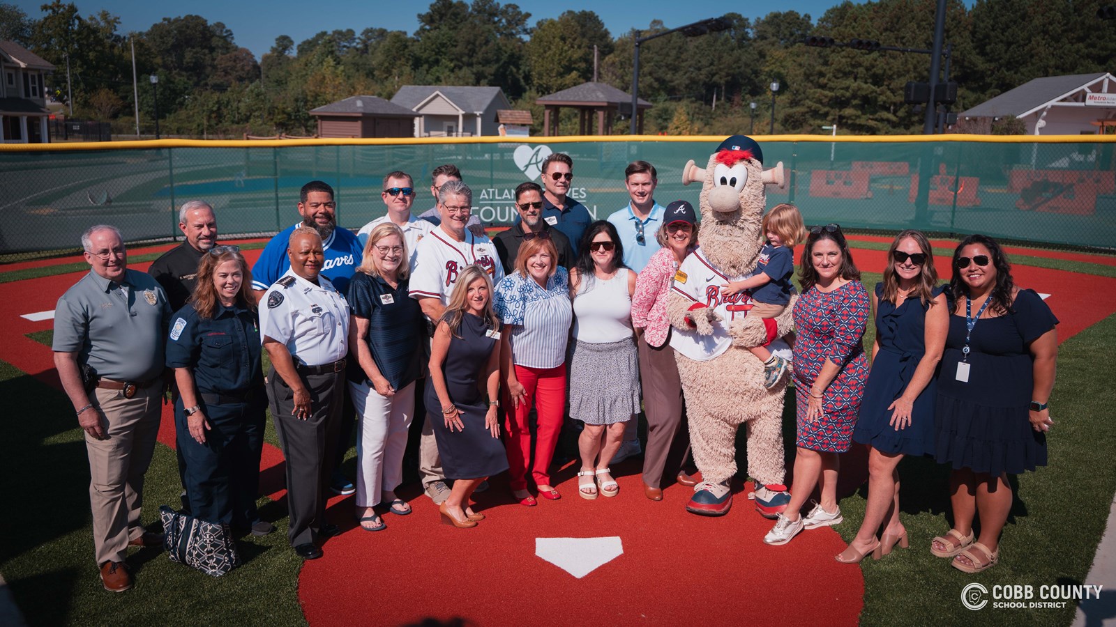 Group photo in news Braves miniature stadium