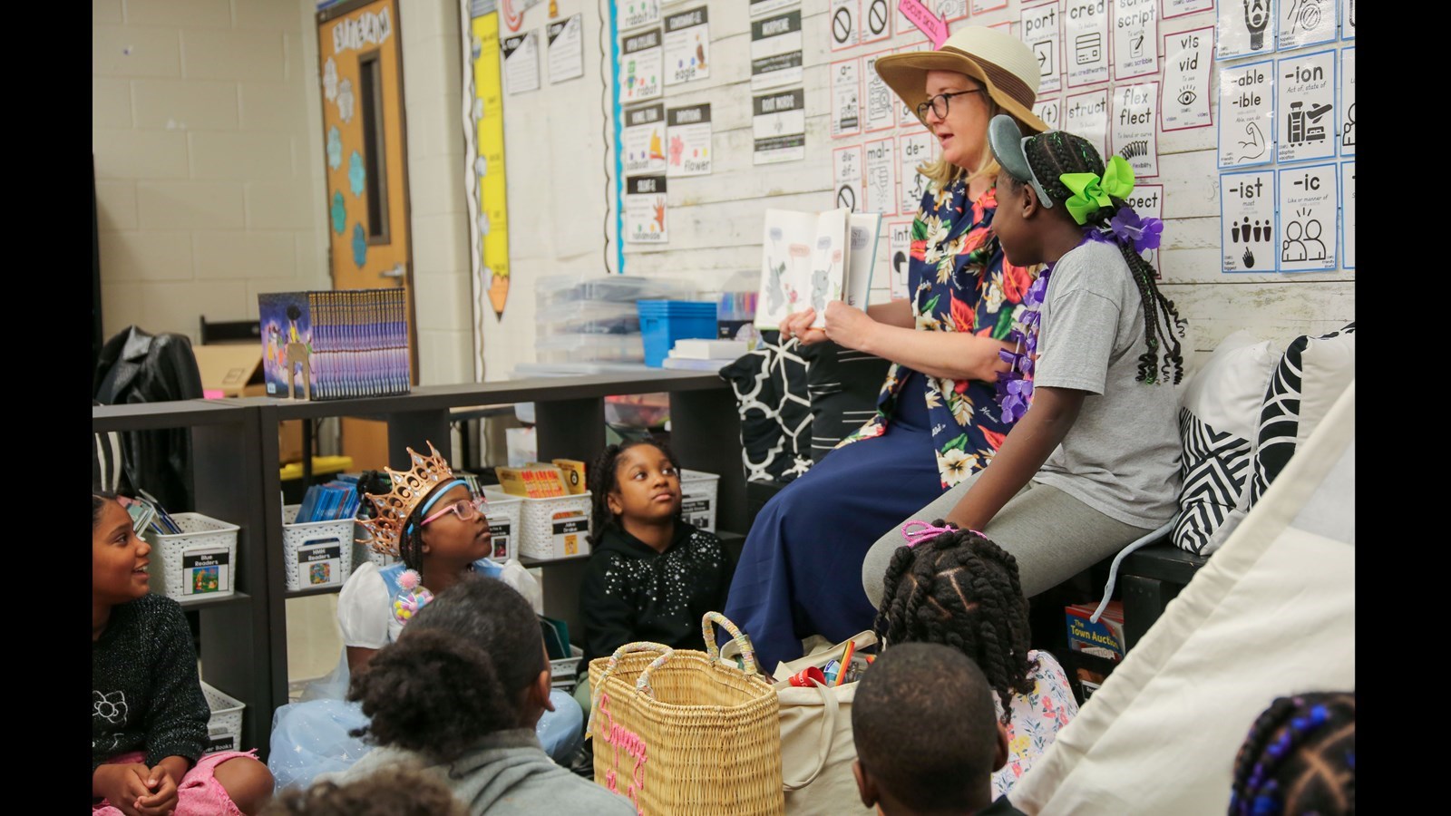 Cobb Schools Board Member Becky Sayler shares the joy of reading with students during a Read Across Cobb event, inspiring young learners to explore new stories and ideas.
