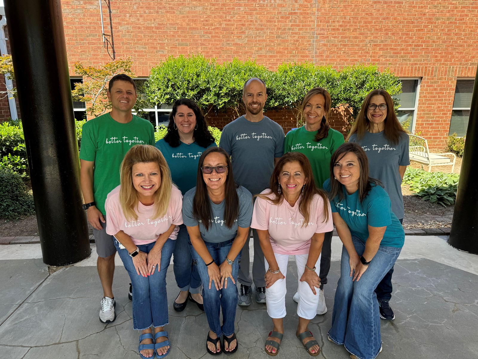 Picture, Front Row: Nicole Norris, Kara Kalra, Amany Demian, and Claire Cyr Back Row: Nick Perkins, Leslie Maples, Craig Hurley, Kelly Mattingly, and Shirley Trammell