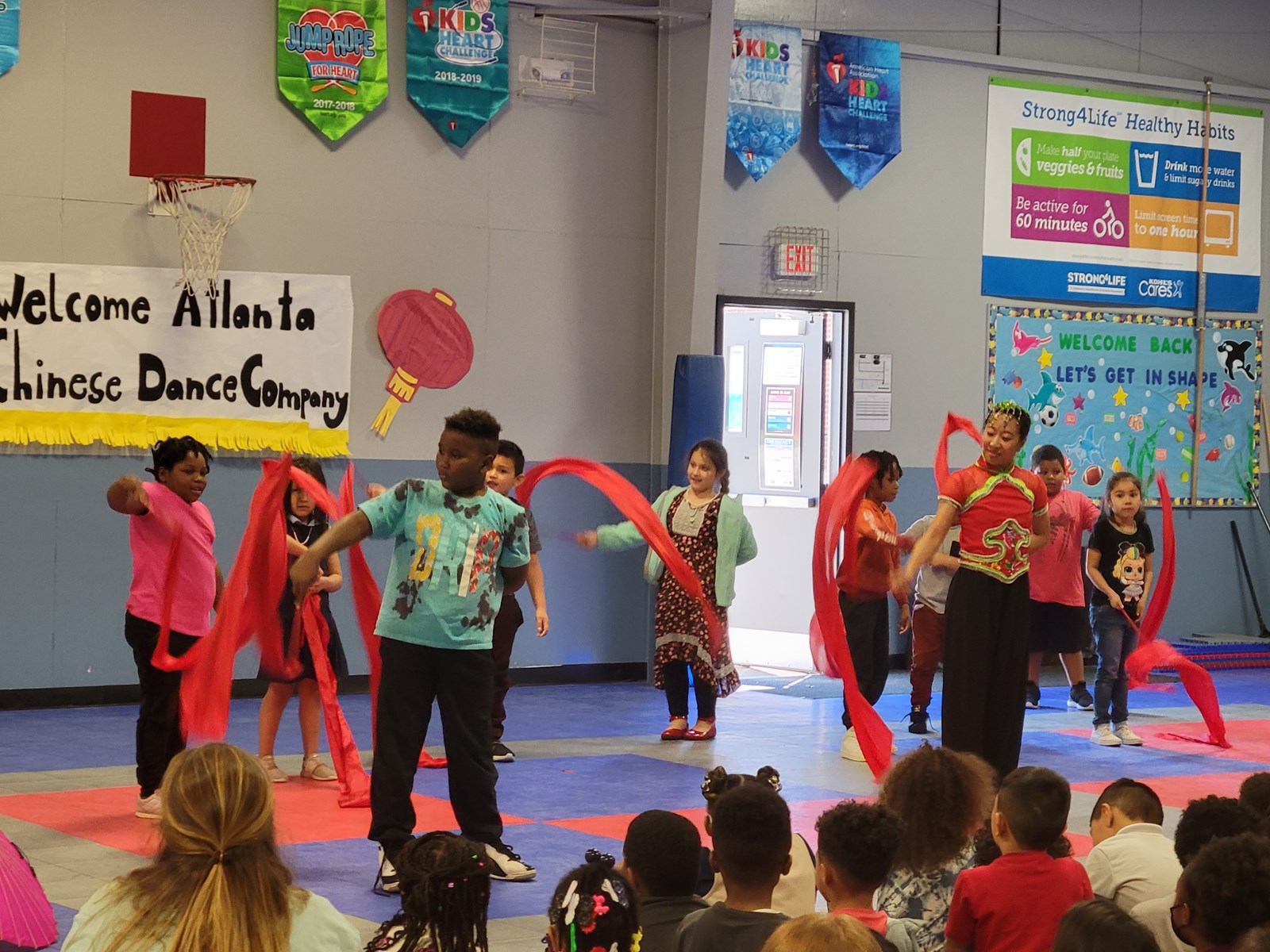 Students trying Chinese ribbon dancing