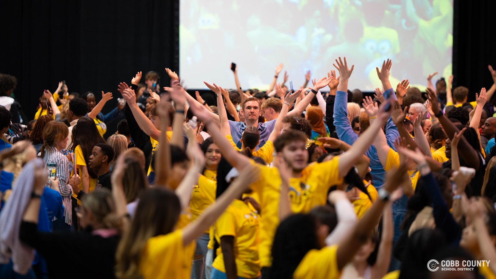 Special student guests from across Cobb County and Kennesaw Mountain High School student volunteers fill the gym with energy, laughter, and non-stop moves at the much-anticipated Dance of the Year!