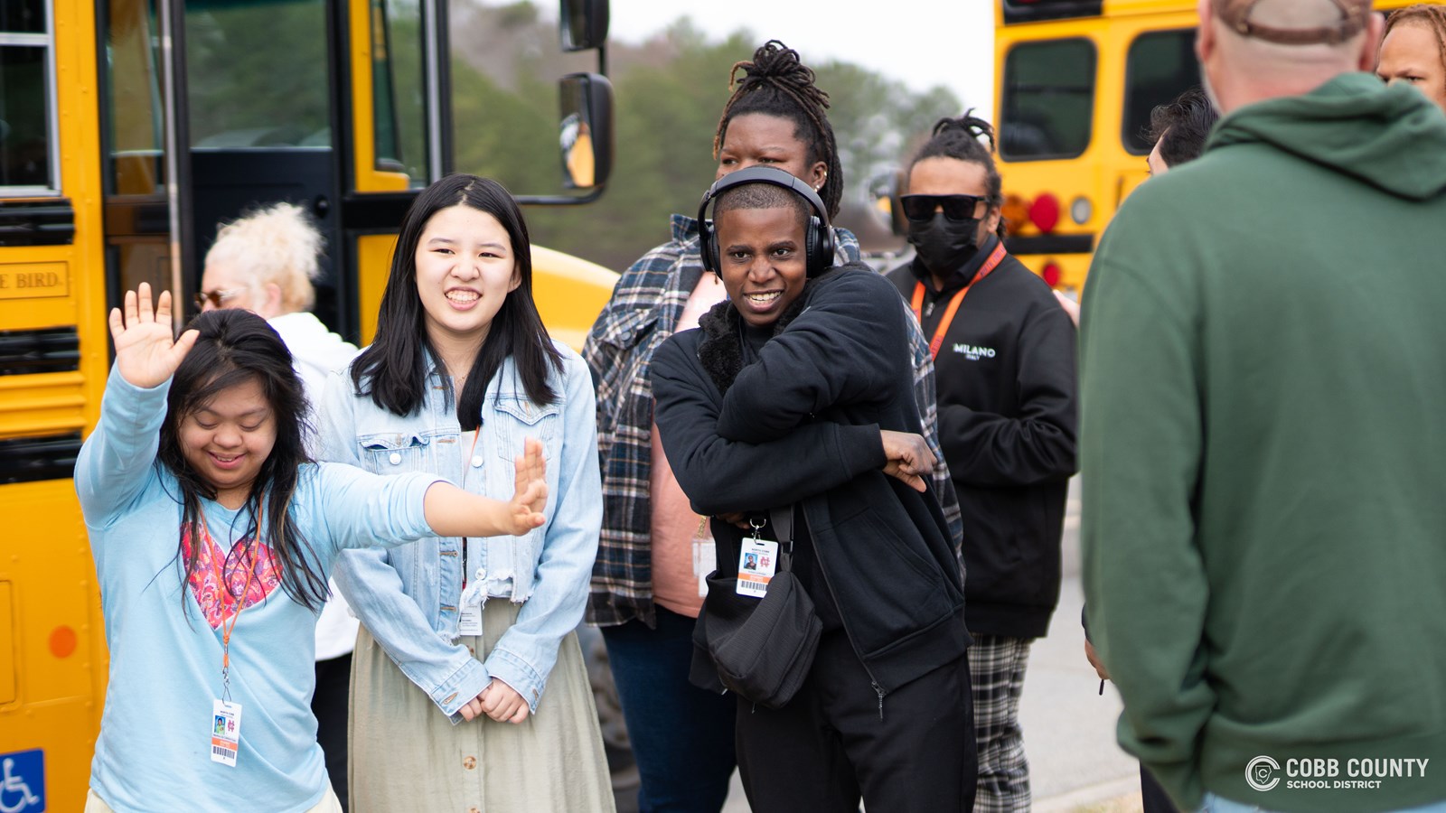 Guests arrive at Kennesaw Mountain High School for the Dance of the Year hosted for students with special needs from around Cobb County.