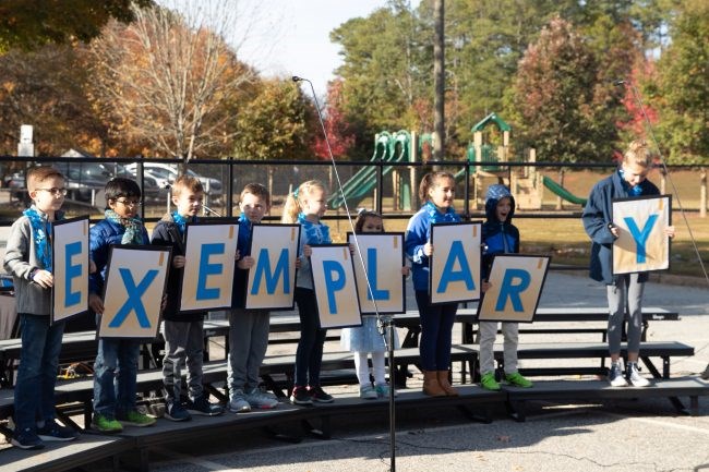Tritt Elementary Students Holding Exemplary Sign