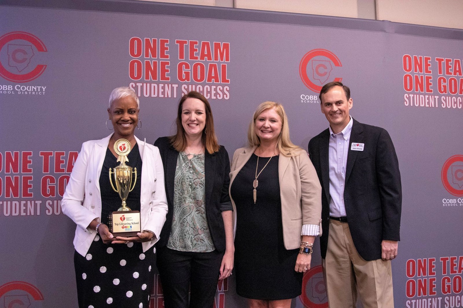 Mrs. Broadnax receiving the Top Lifesaving Trophy Award for Ford being ranked #1 for Cobb County last year.