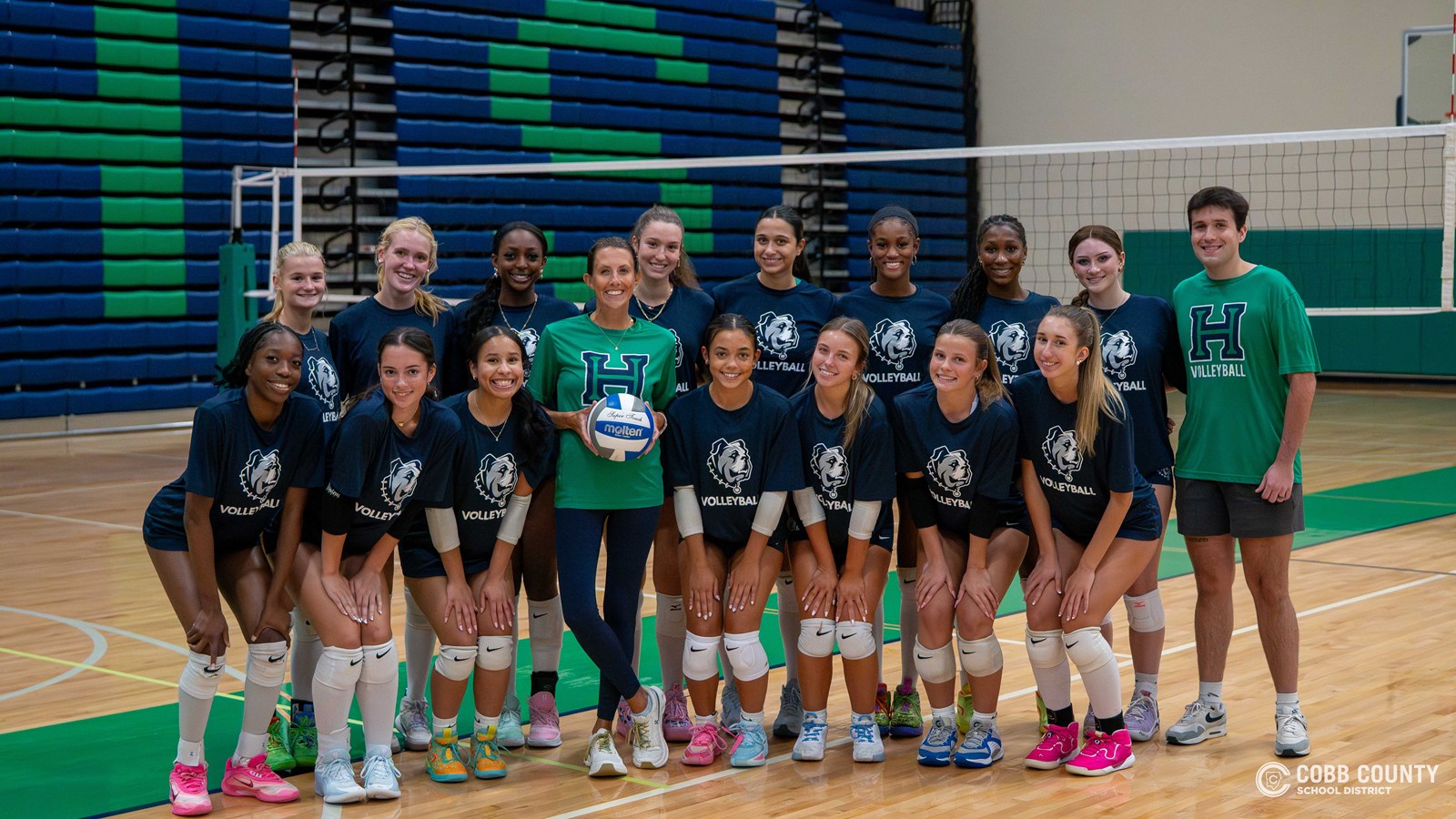Coach Johnson with her 2025 Harrison High School players 