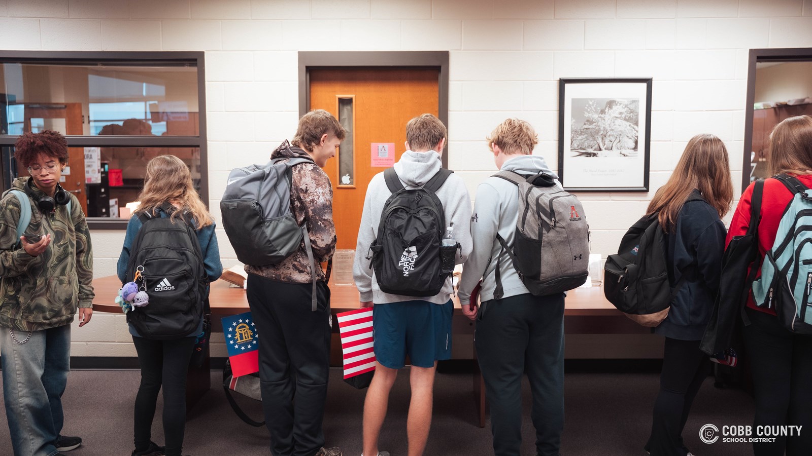 Students looking at artifacts