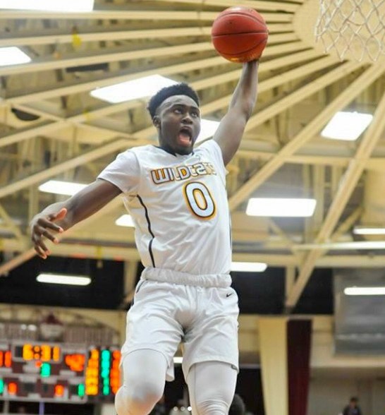 Jaylen Brown soars for a slam during his high school playing days