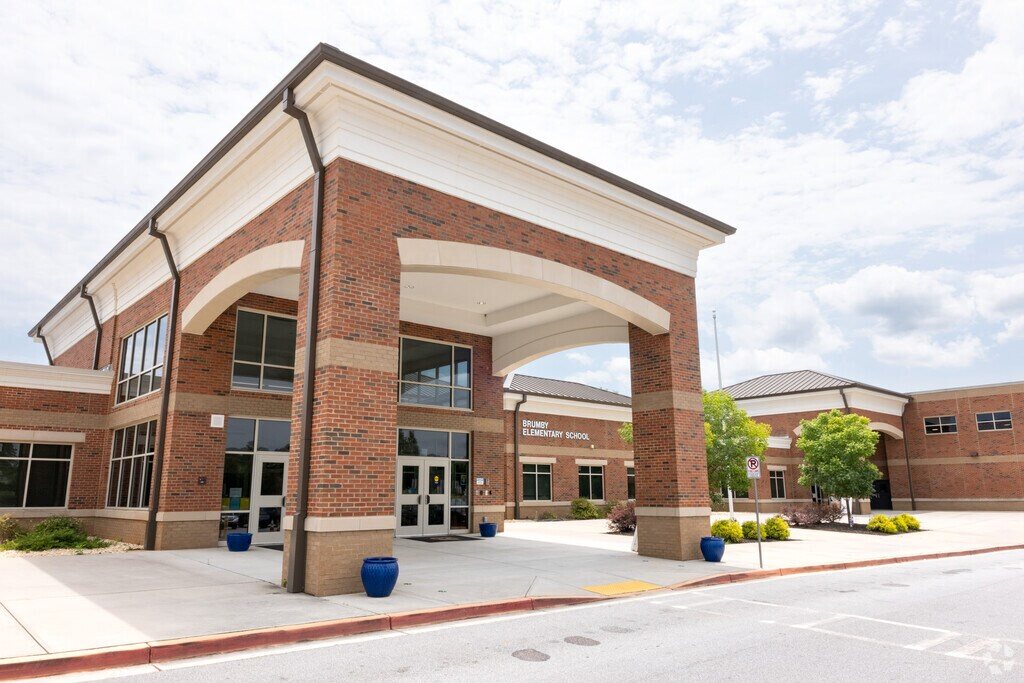 brumby-front-of-building.c2e909135294.jpg