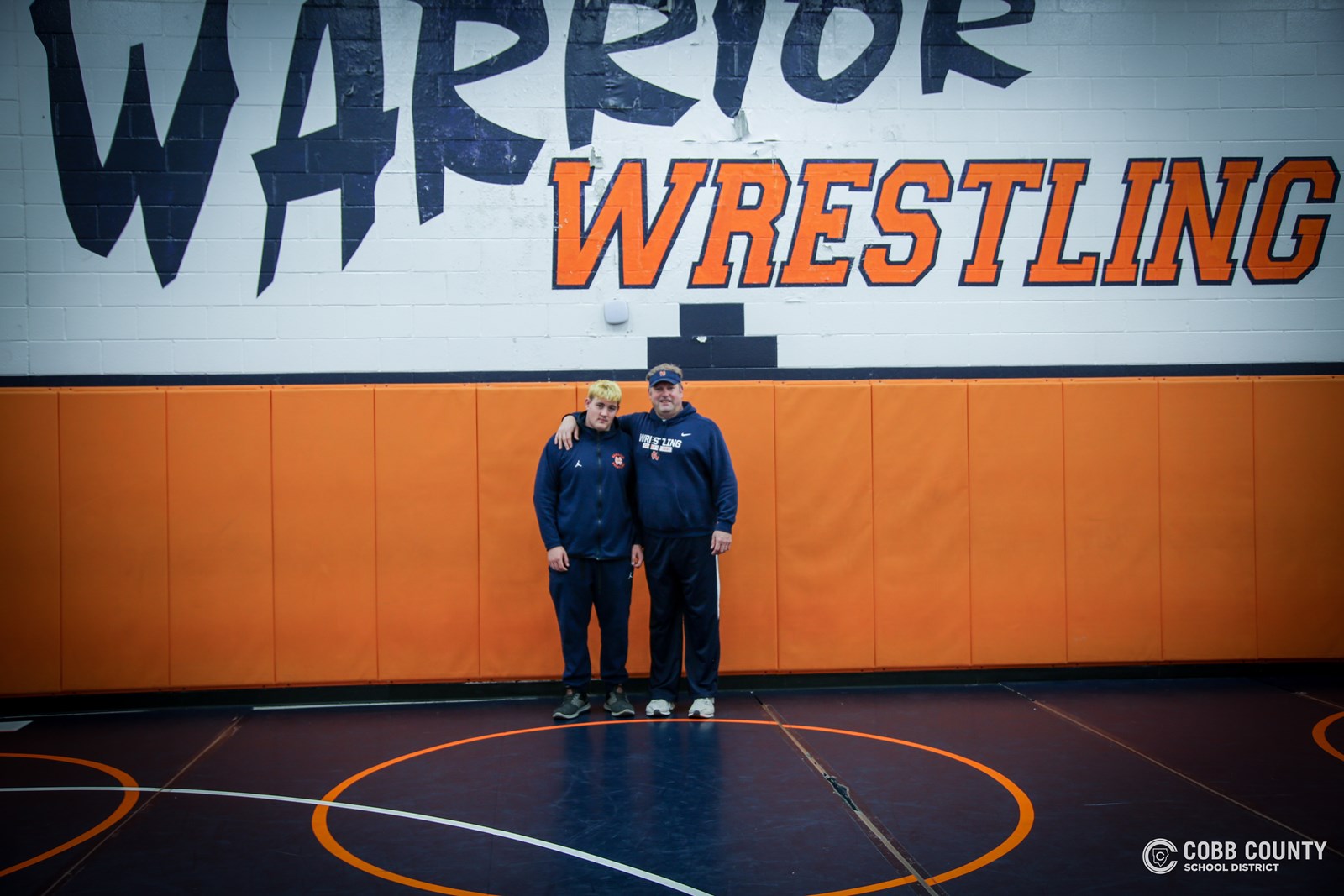 Coach Fredenburg and Madden