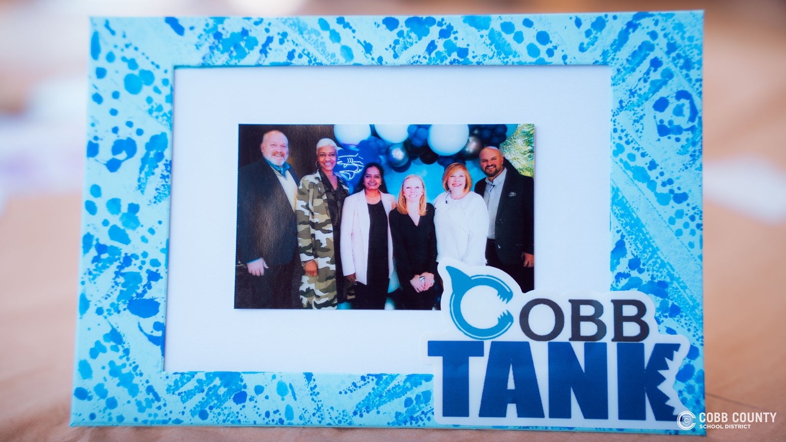 Polaroid photo of "sharks" at Cobb Tank 2025