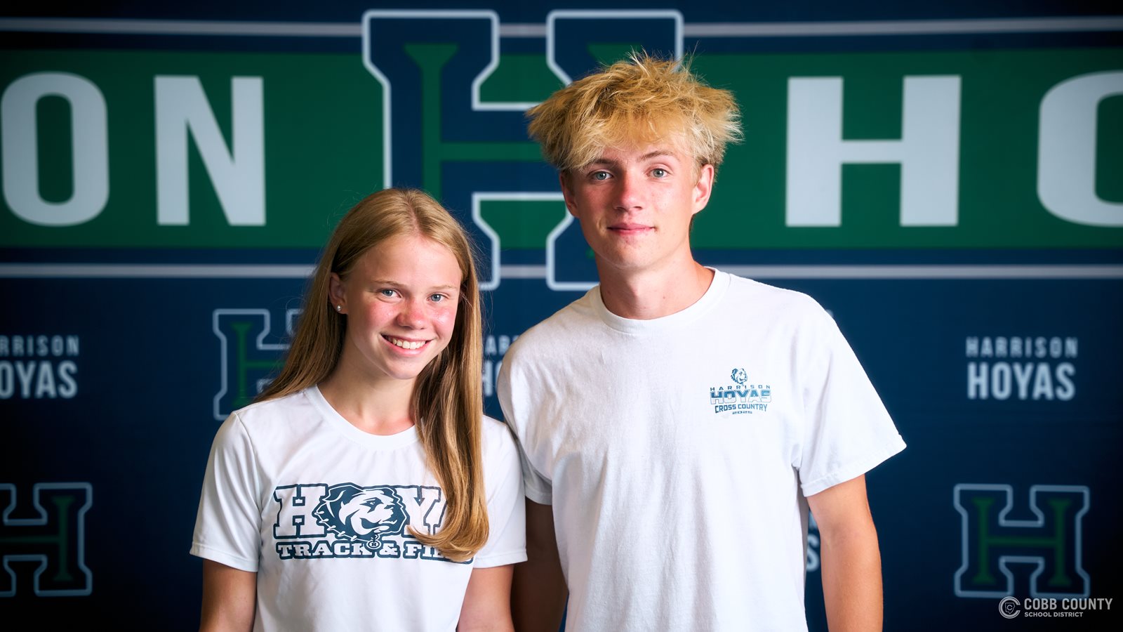 Riley and Paige Comstock, from Harrison High School, are elite long-distance runners