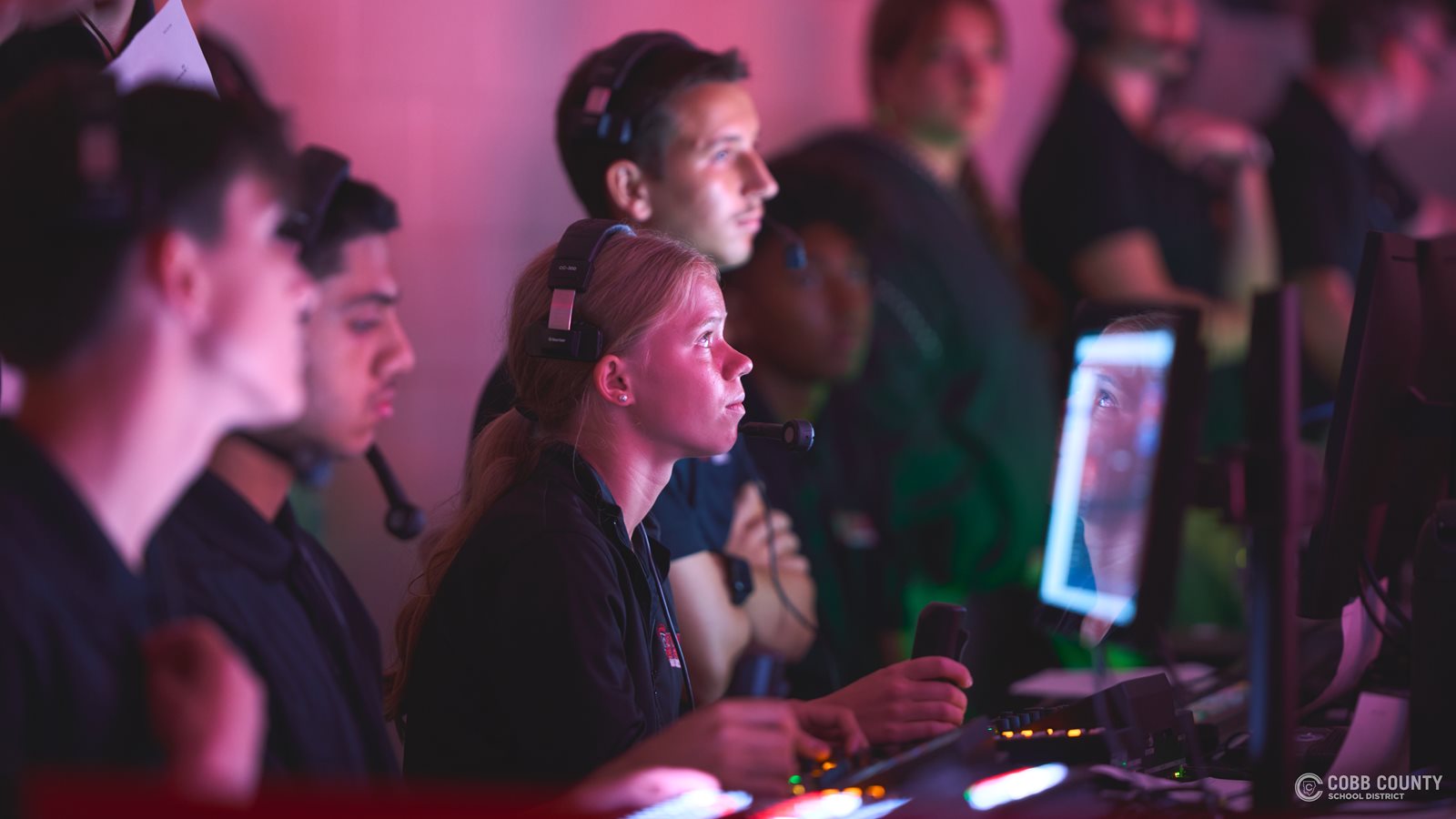 Paige Comstock watches intently during a live event