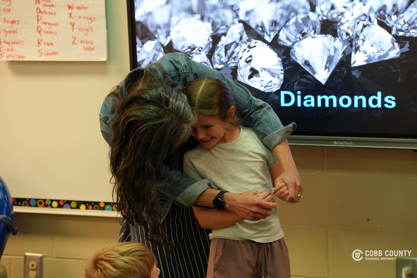 Dazzling Diamonds for Mom writing contest winners help bring Mother's Day surprise!