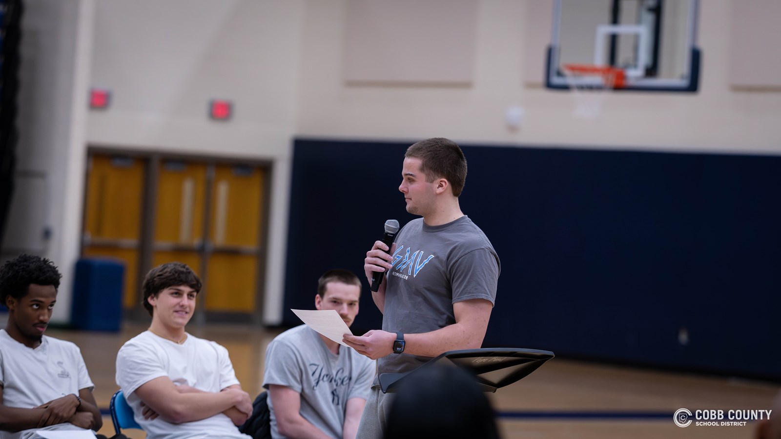 Pope senior Drew Abney addresses his teammates