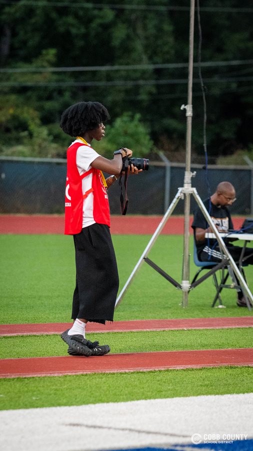 South Cobb's Zion Bualice takes photos as a CSN intern