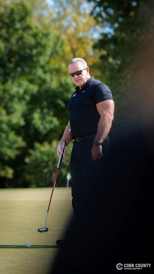 Cobb Schools Superintendent Chris Ragsdale on the putting green