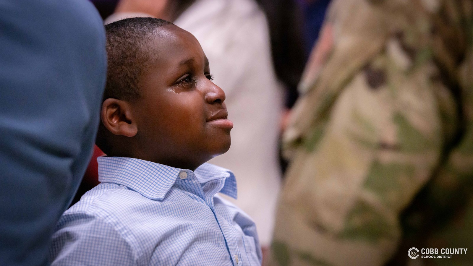 Amare Gore being surprised by his dad 