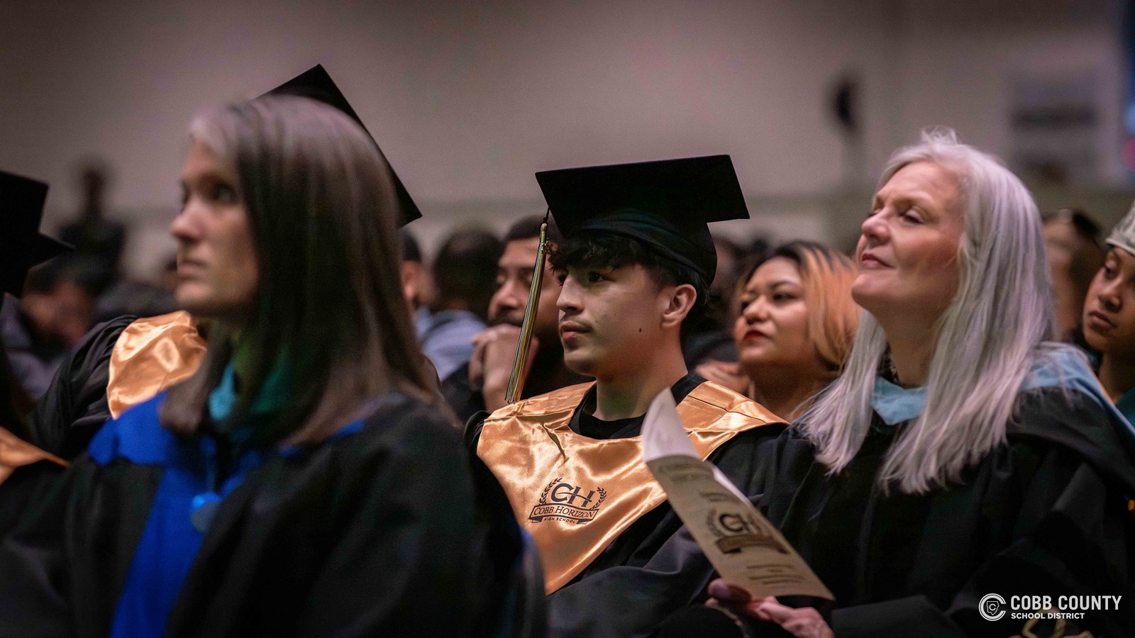 Graduates celebrate a milestone as they complete their high school journey at Cobb Horizon High School.