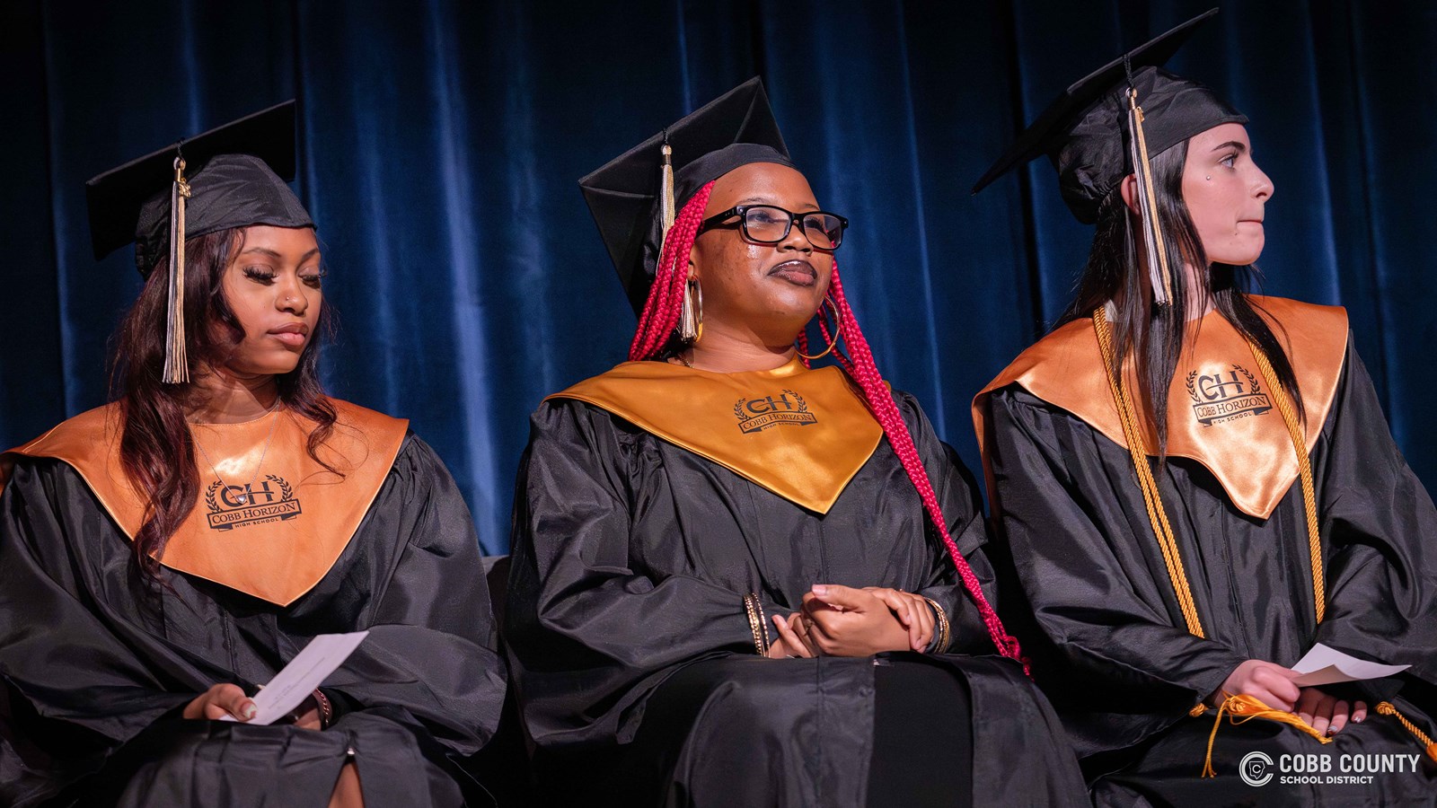 Graduates celebrate a milestone as they complete their high school journey at Cobb Horizon High School.