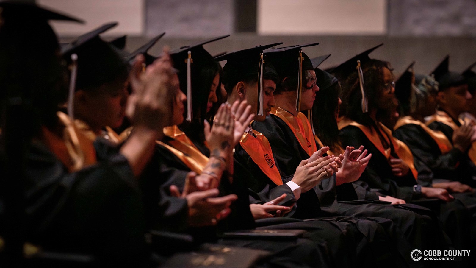 Graduates celebrate a milestone as they complete their high school journey at Cobb Horizon High School.