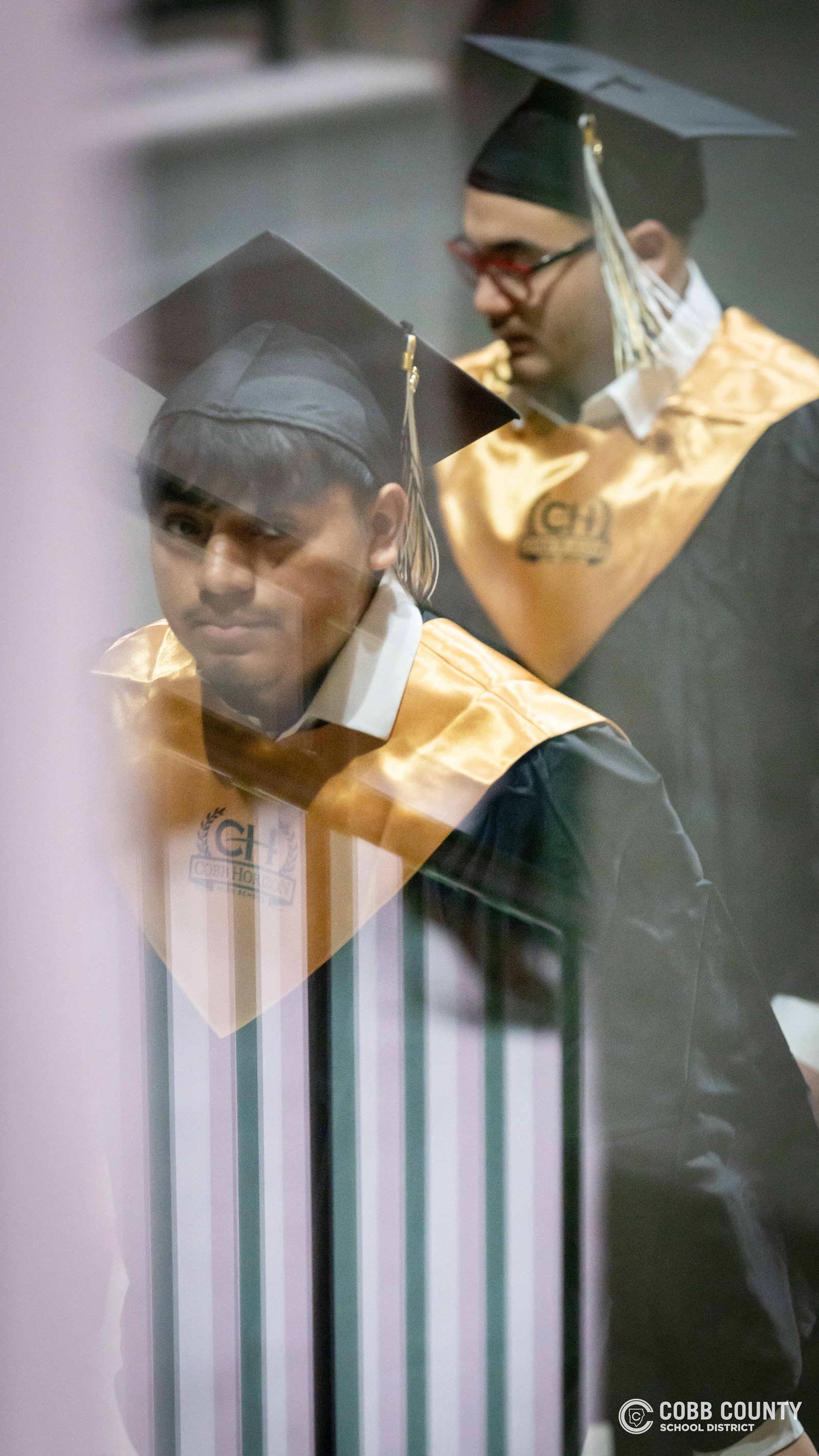 Graduates gather following the ceremony to mark the completion of their high school education.