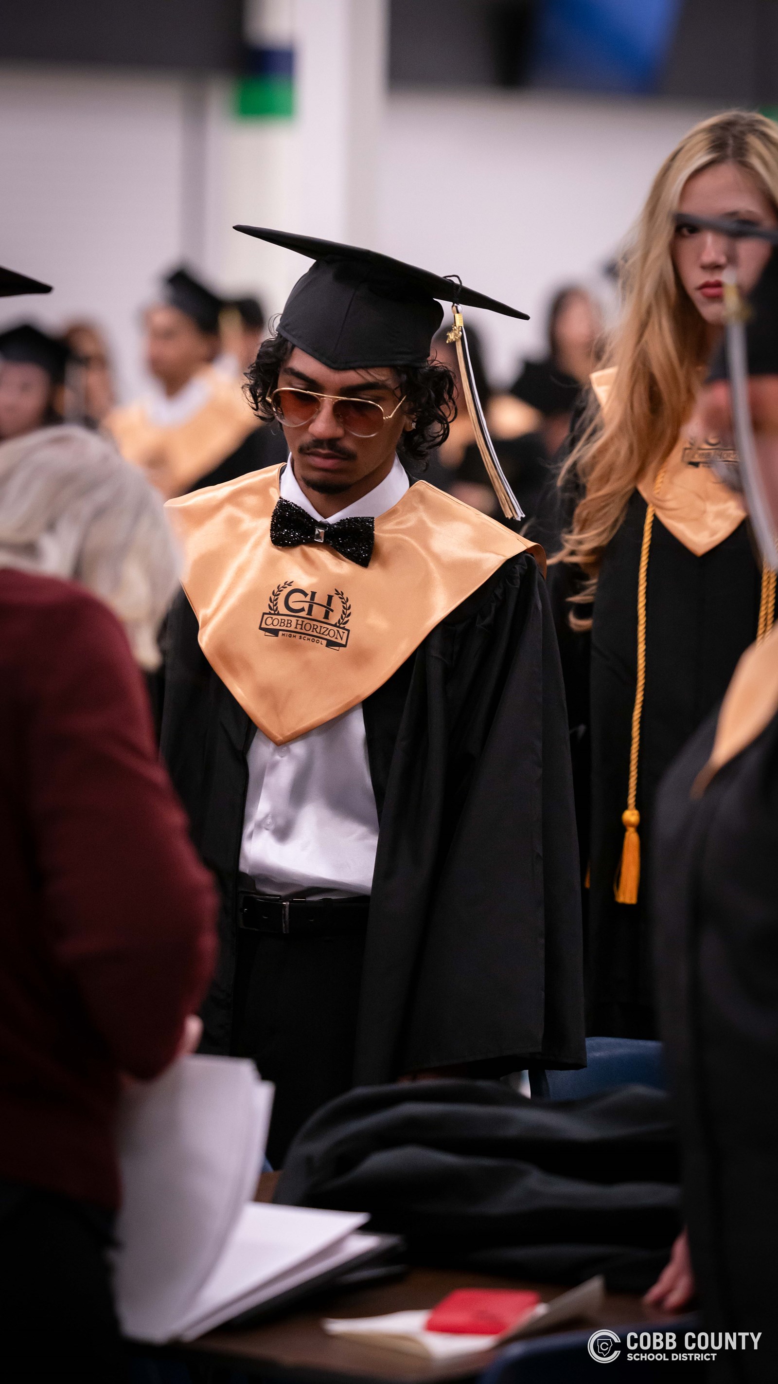 Graduates celebrate a milestone as they complete their high school journey at Cobb Horizon High School.