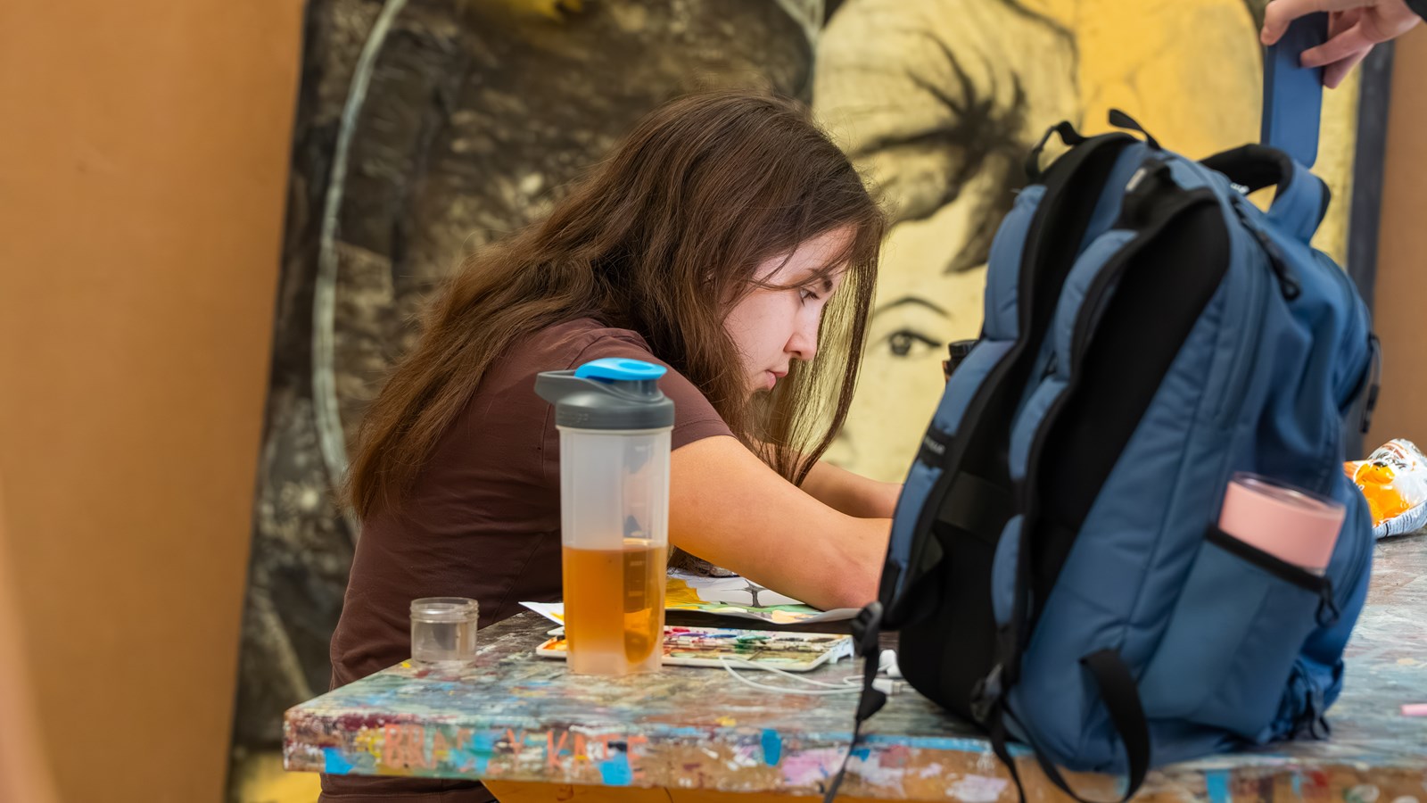Livia Ross works in a classroom at Campbell High School