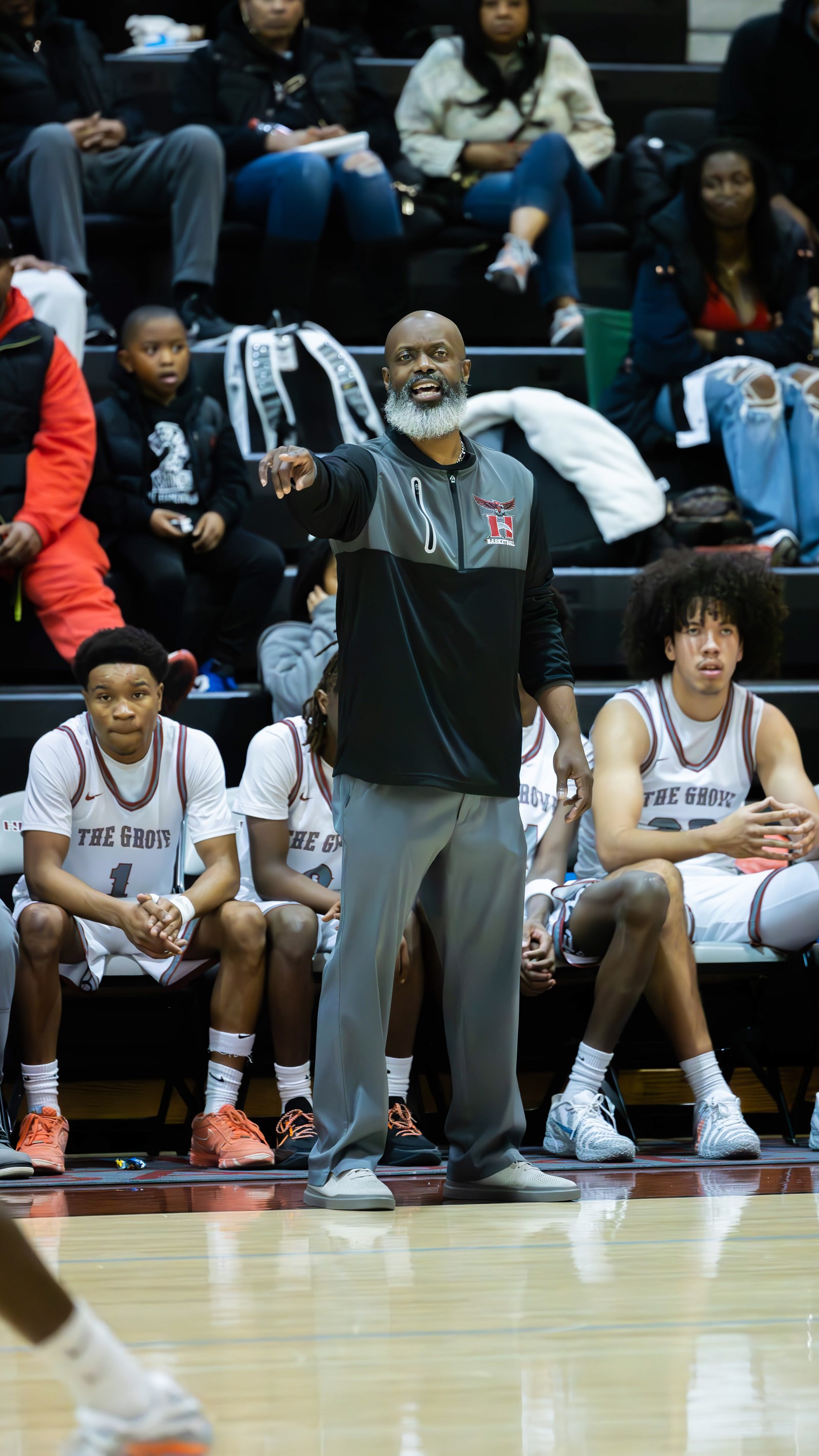 Hillgrove Head Coach Gregory Moultrie instructs from the sidelines during a game