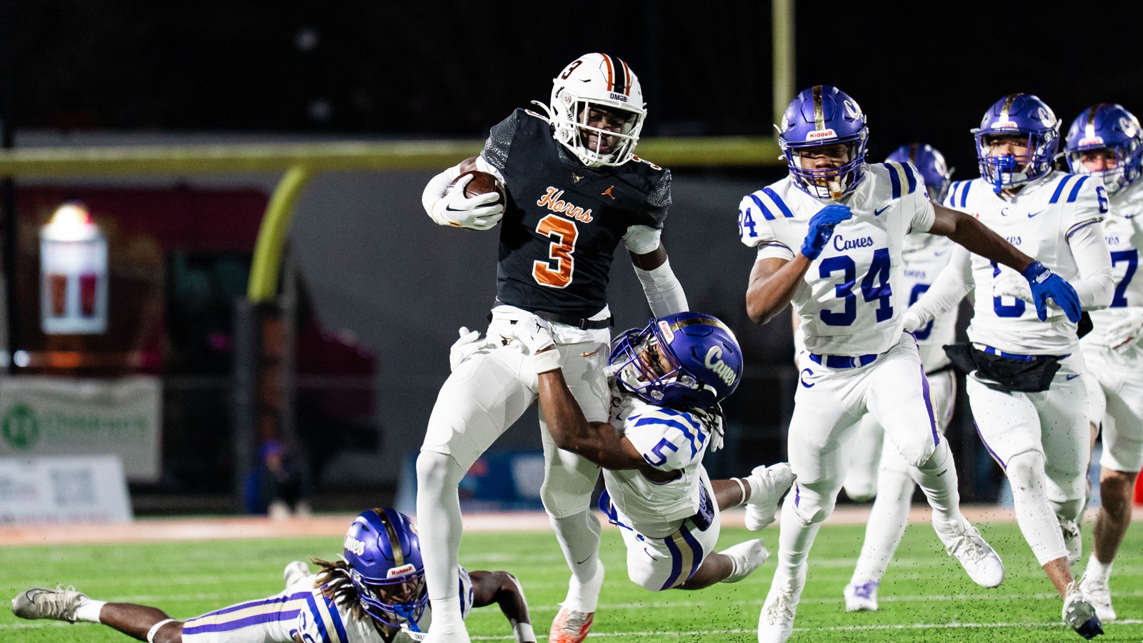 Kell's Brock Burrus breaks a tackle