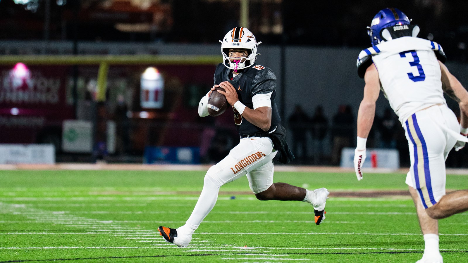 Kell quarterback Kaleb Narcisse looks for a receiver