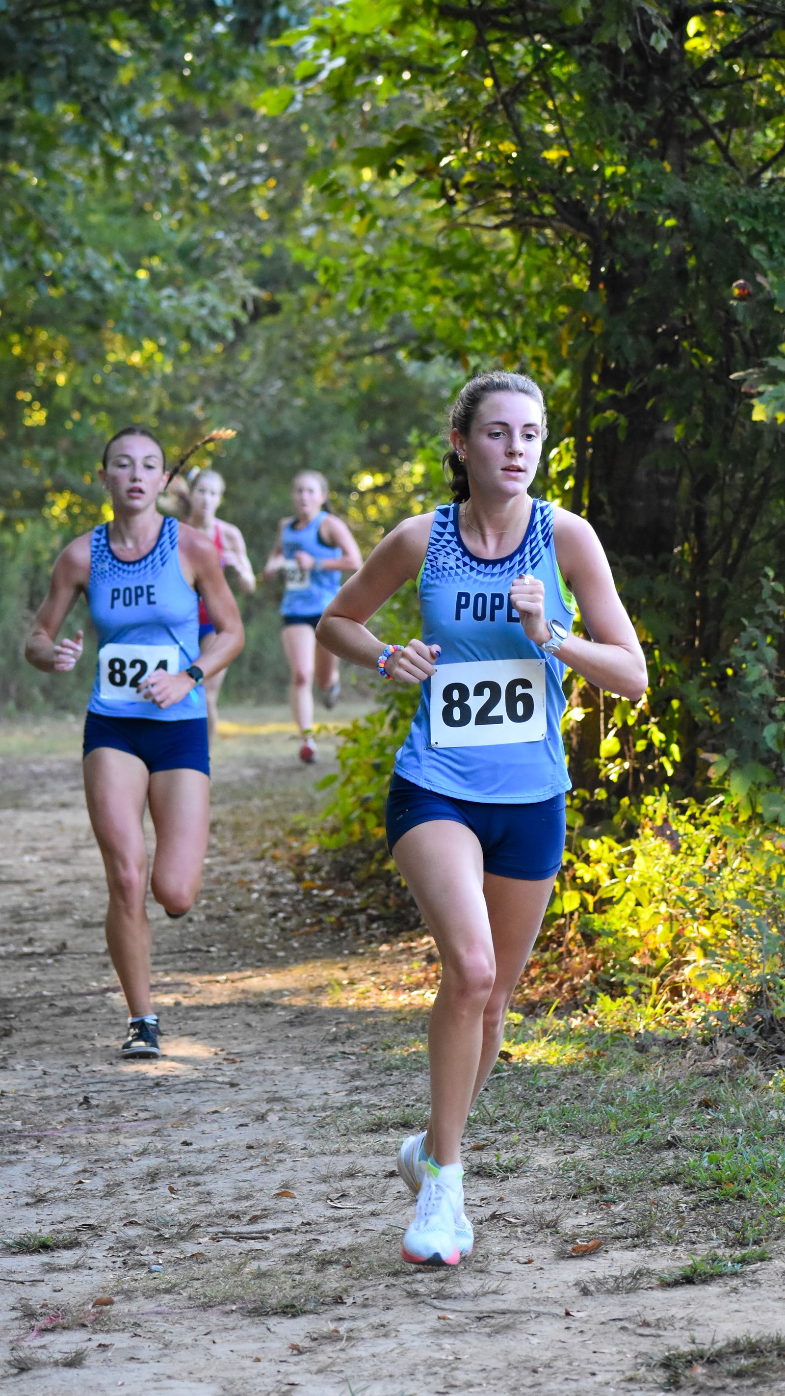 Pope's Josie Hutchinson running through the trees