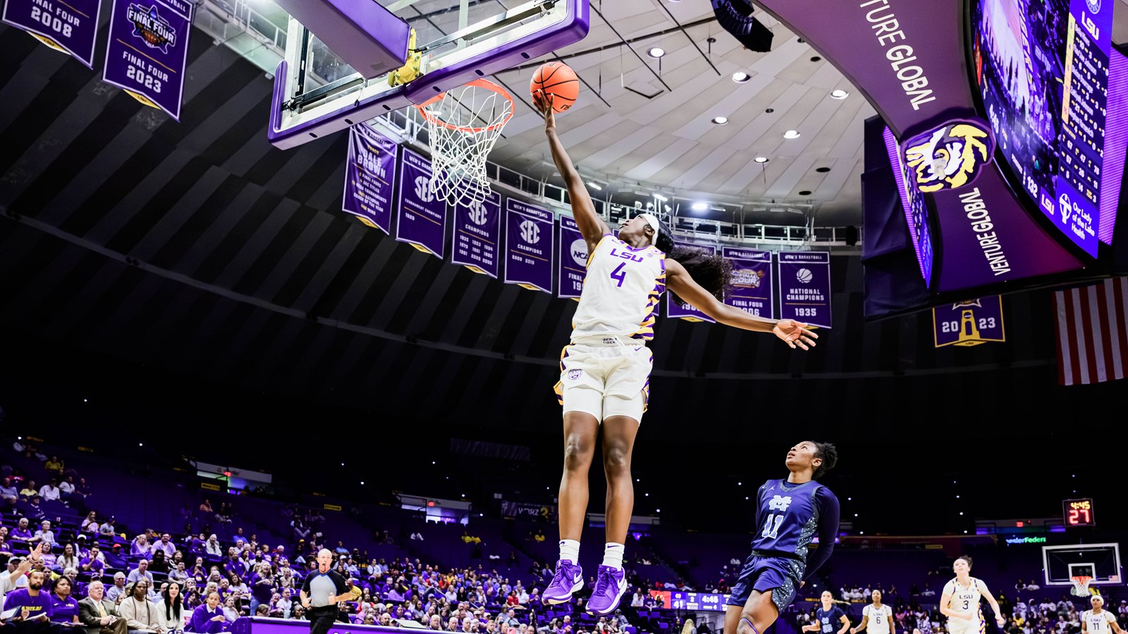 Flau'jae Johnson soars in for the layup for LSU