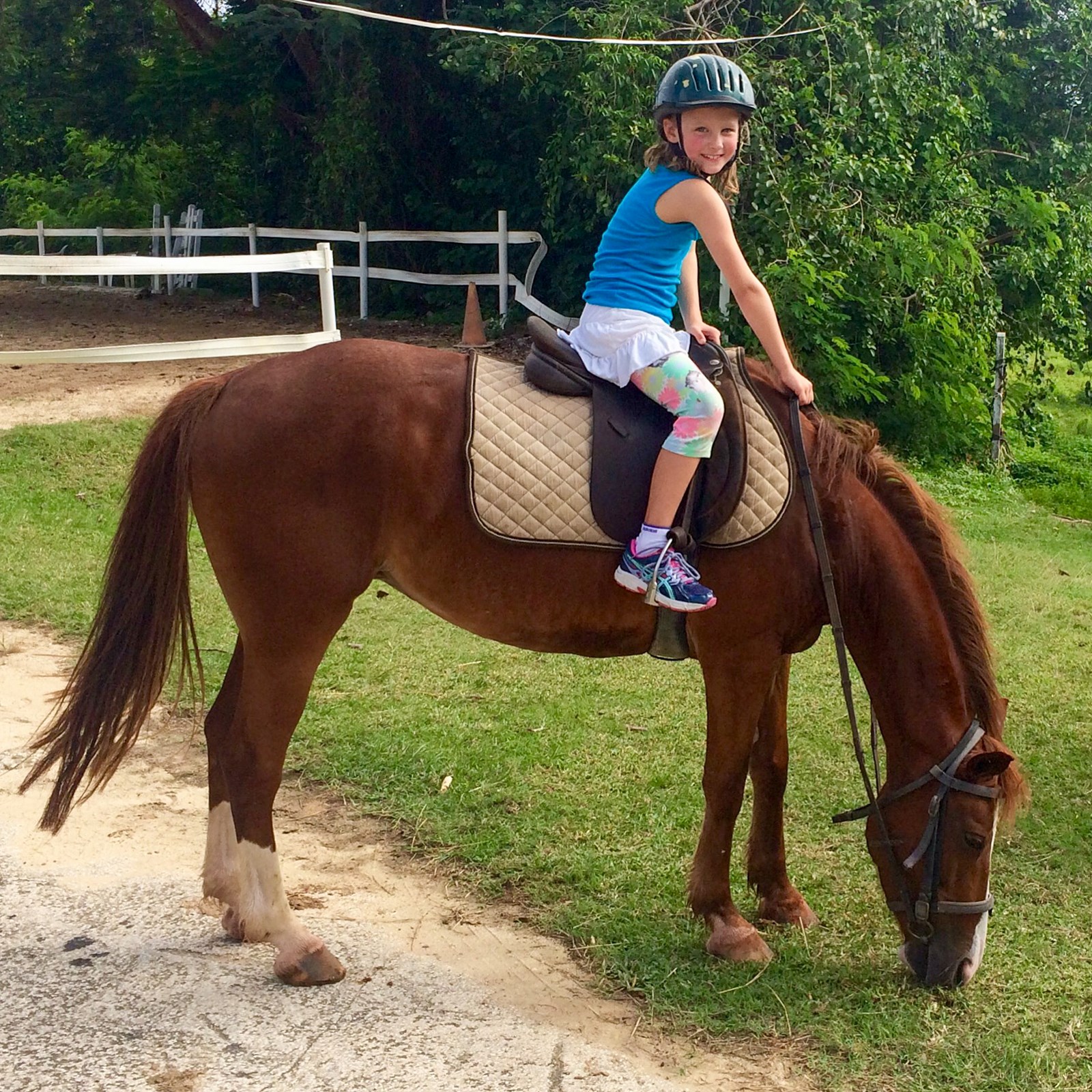 8-year-old Anna in one of her earliest times on a horse