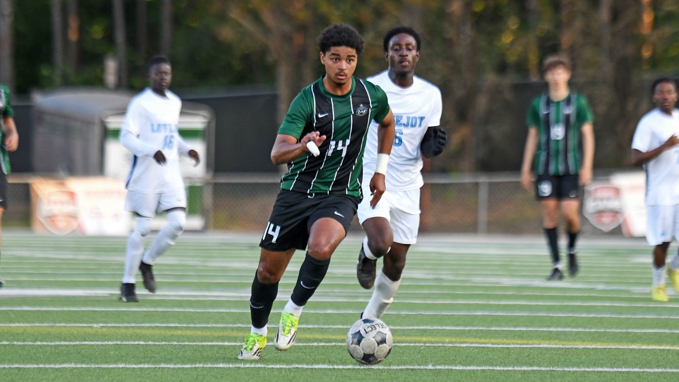 Kennesaw Mountain's Nathan Leveque dribbles upfield