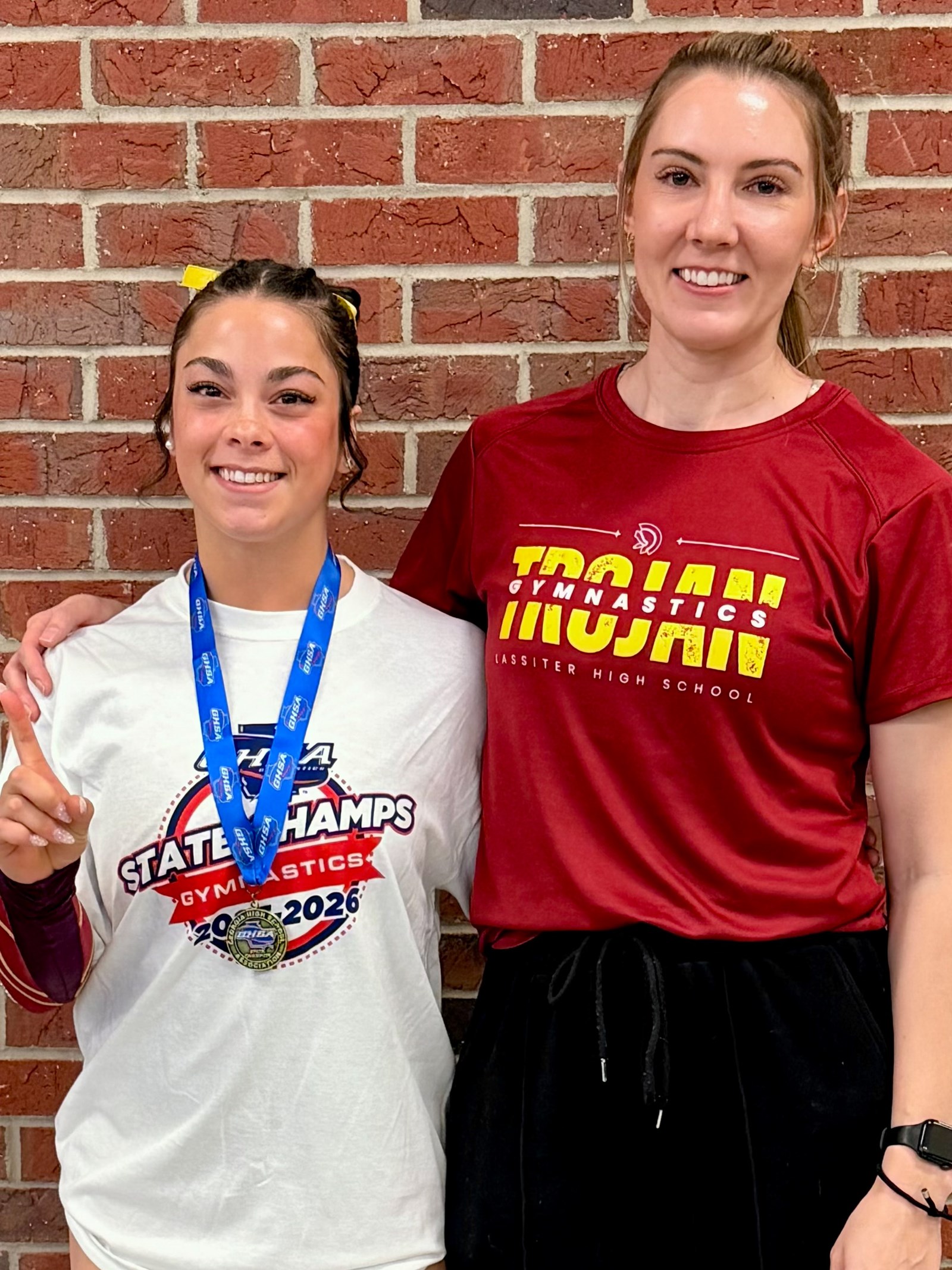 Lassiter’s Jolee McCauley poses with her state champion medal.