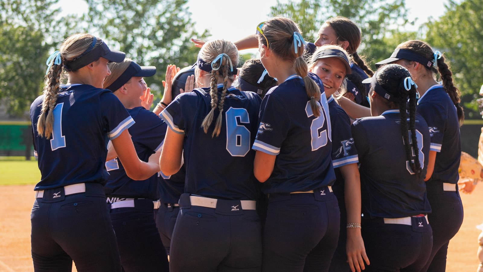 Pope's softball team celebrates a win