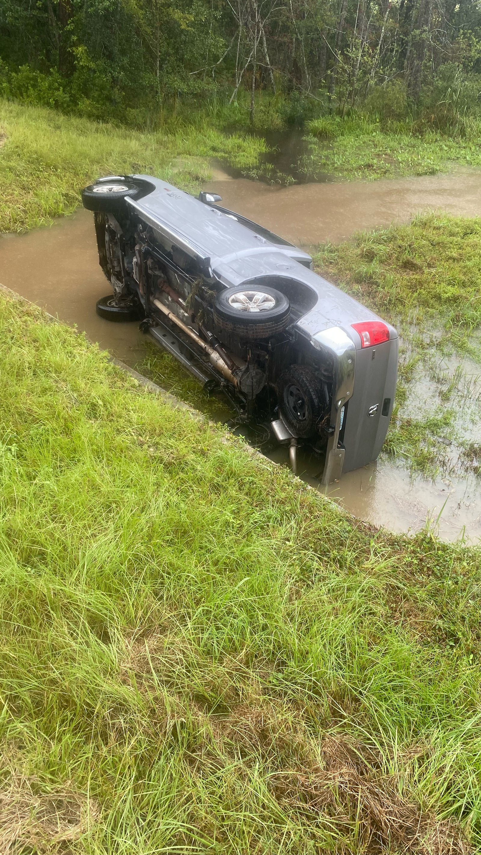 Accident picture showing truck in standing water