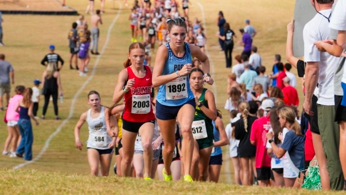 Josie Hutchinson ahead of the cross country crowd
