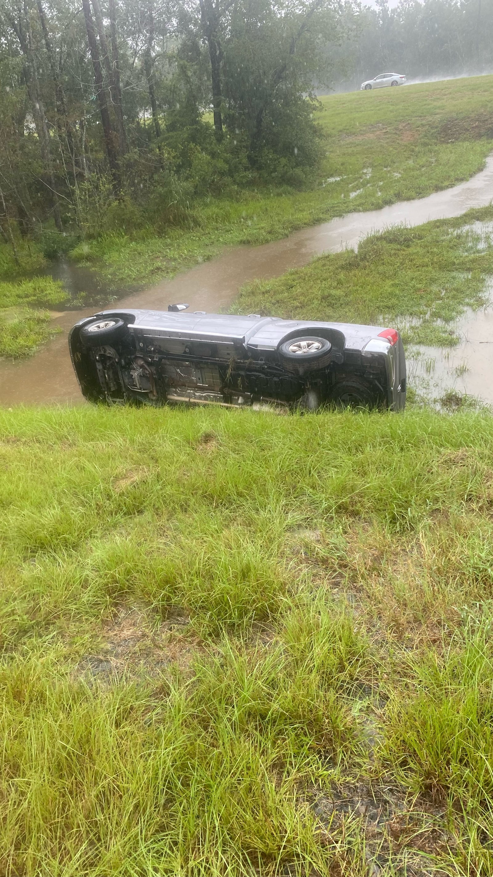 Accident pictures showing overturned truck